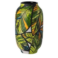 Vaso di foglie tropicali