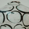 Vaso di manganese e cerchi verde rame