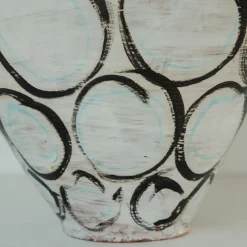 Vaso di manganese e cerchi verde rame