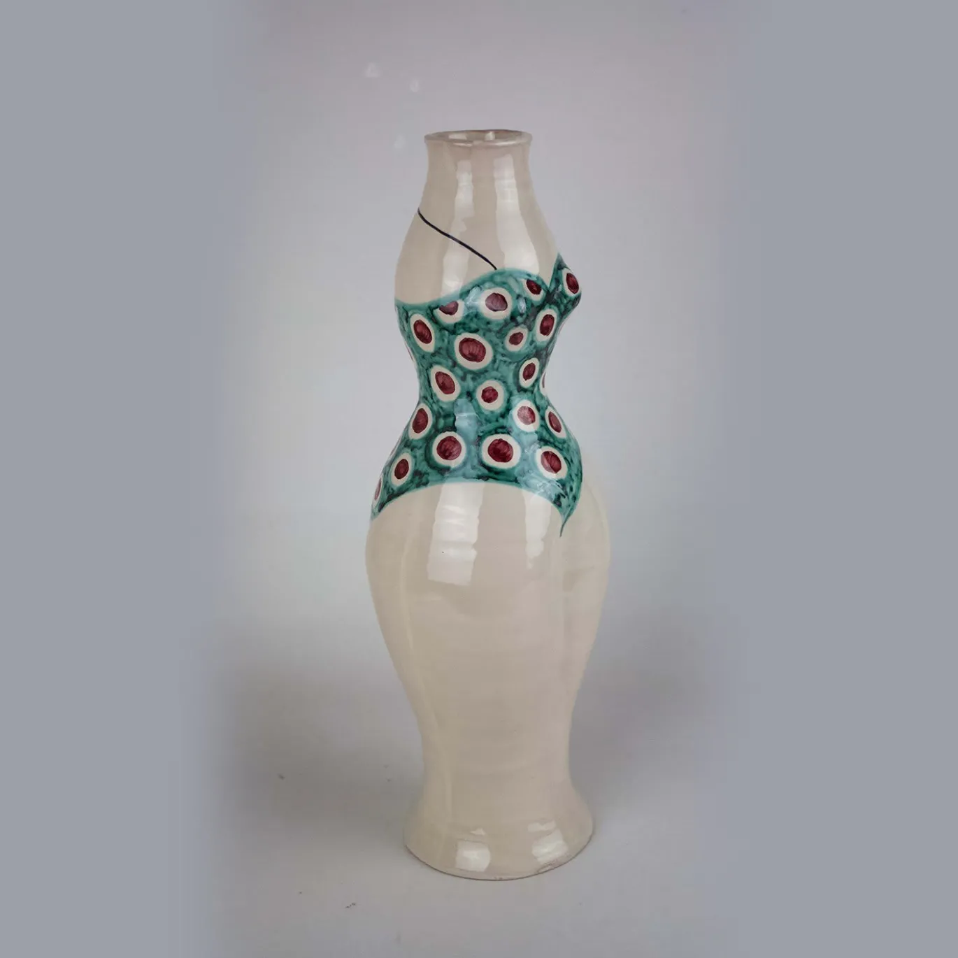 Vaso scultura in ceramica con costume da bagno a pois